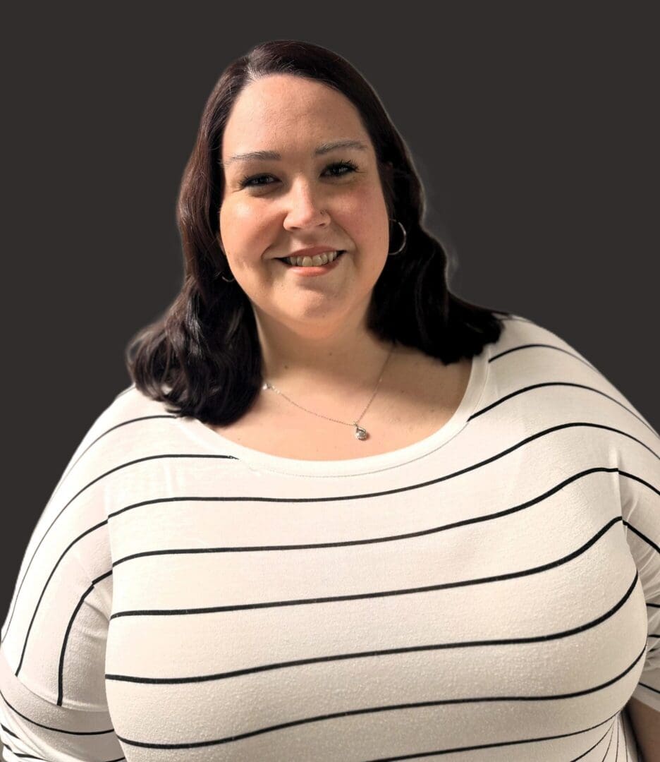 Smiling woman in white striped top